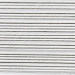 Close-up of pure white New Line Stone with fine horizontal linear grooves