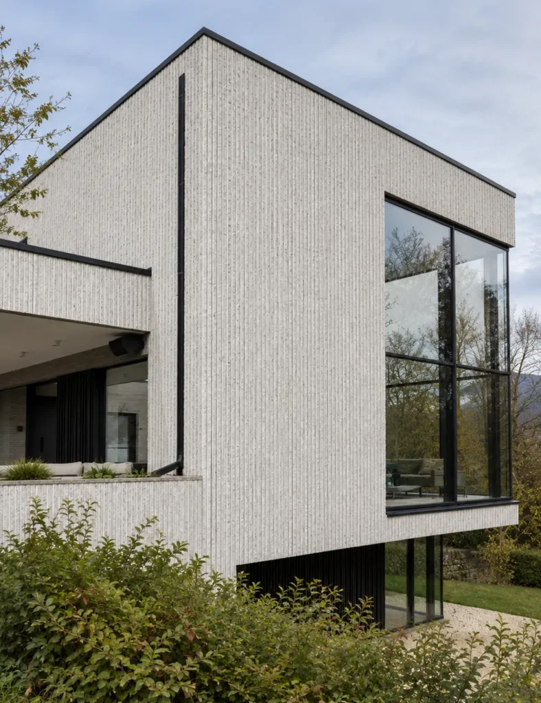 Modern house facade finished with light Oman Line Stone linear flexible stone cladding