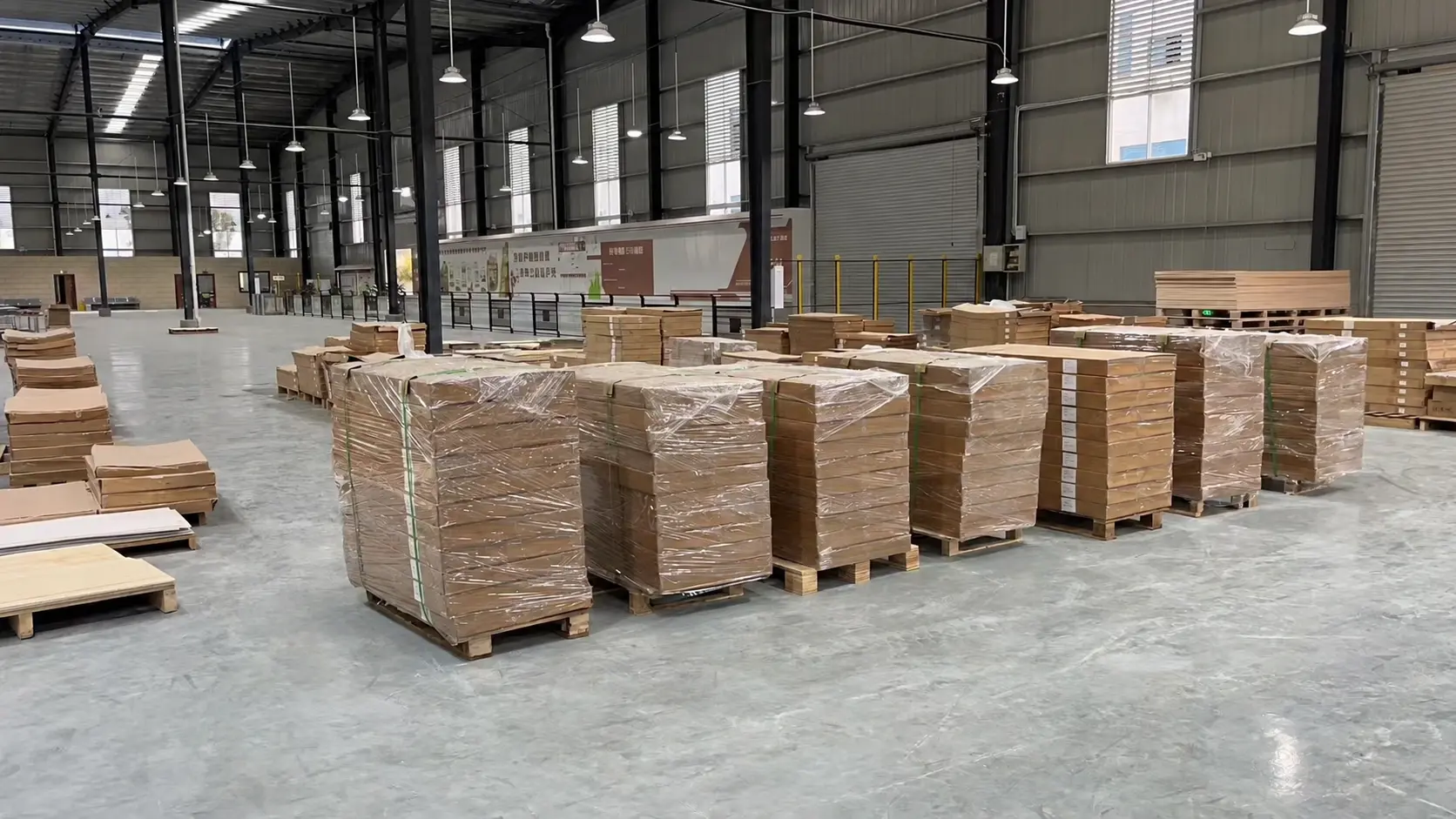Packed flexible stone products on pallets inside the YITA warehouse ready for export shipment.