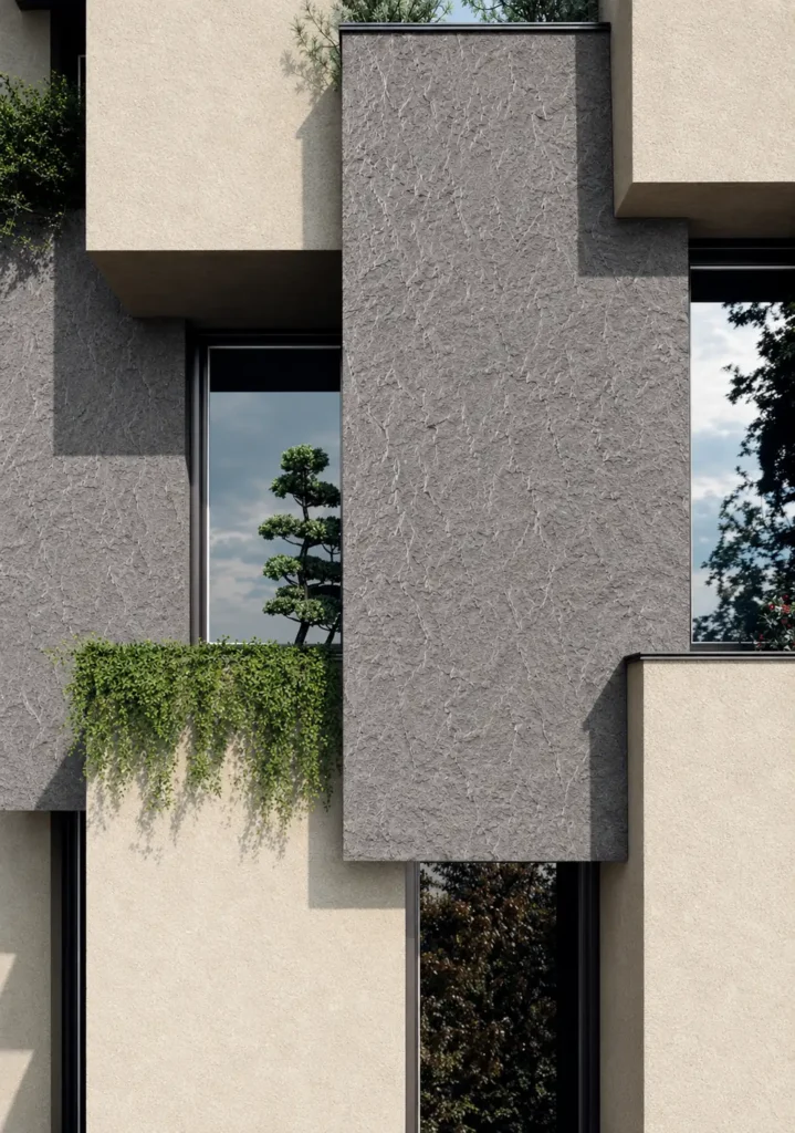 Gray Star Moon Stone Texture used as exterior wall cladding on a modern residential facade