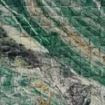 Green mosaic travertine texture with square grid and mottled stone colours