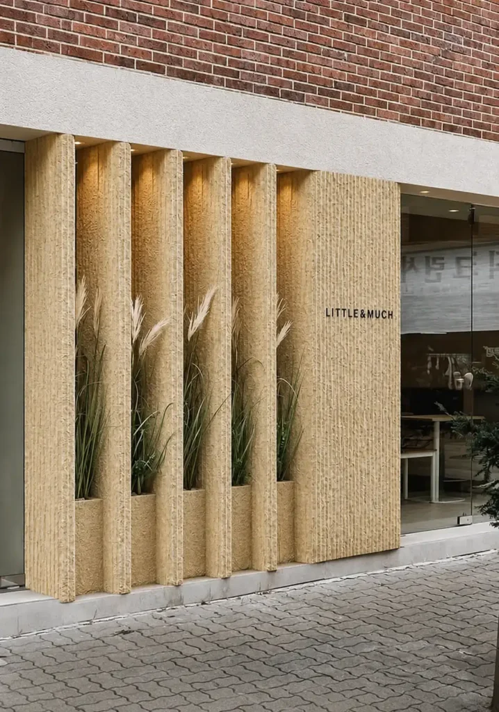 Ivory Stream Flowing Stone Texture used on warm beige vertical facade fins at a modern retail entrance