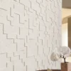 Patterned Travertine Interior Feature Wall | YITA Patterned Travertine feature wall with geometric stone pattern in a warm minimalist interior