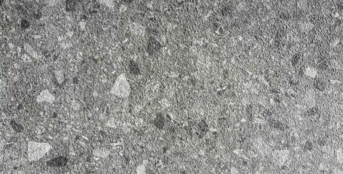 Silver Ash Andesite Texture close-up with layered gray mineral particles and natural stone variation