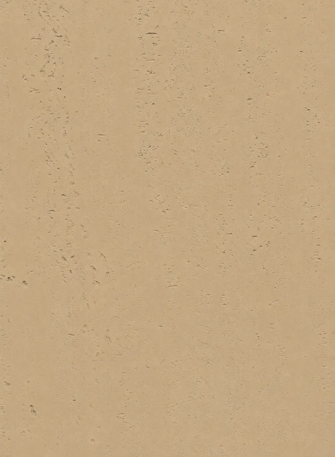 Beige travertine surface with fine pores and natural stone variation
