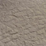Warm Taupe Chiseled Stone Texture close-up with layered stone relief and soft earthy mineral tones
