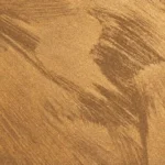 Burnished Gold flexible stone veneer with flowing brushed metallic texture