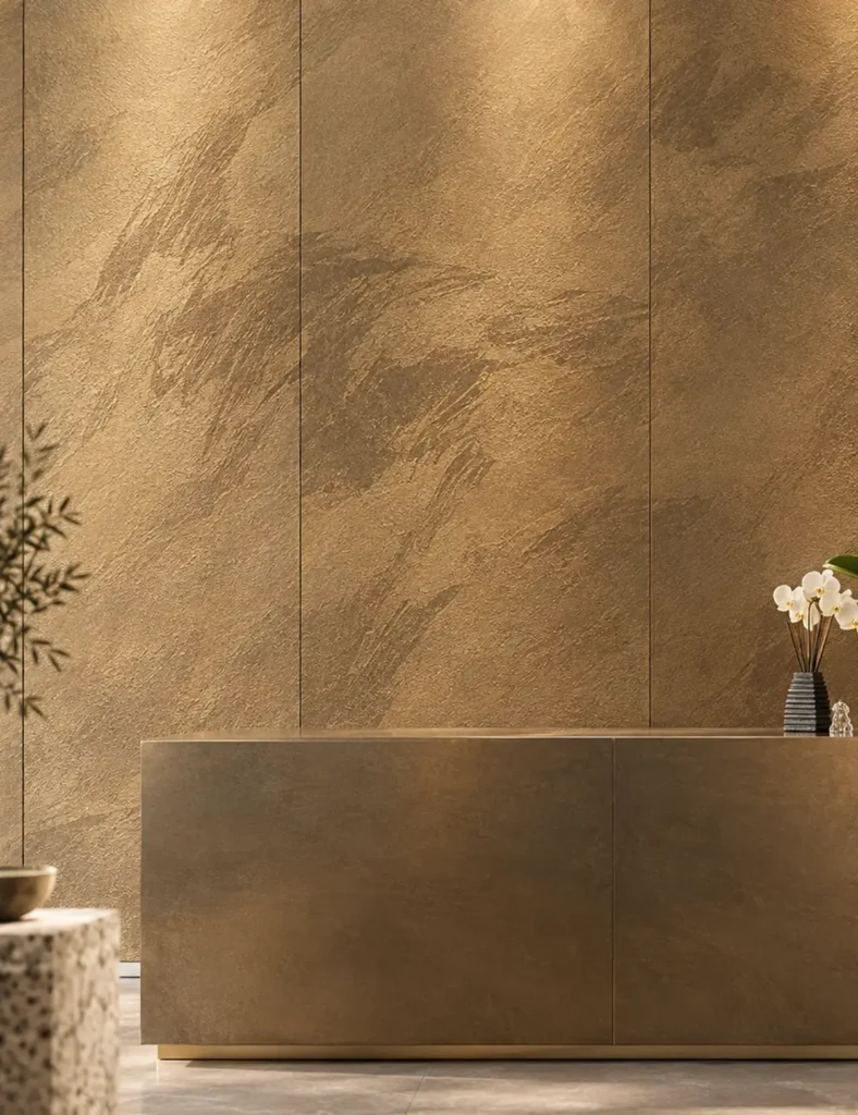 Reception wall finished with YITA gilded flexible stone veneer in a bronze metallic texture