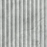 Close-up of mist gray water ripple flexible stone with vertical textured grooves